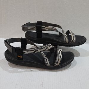 Teva Women's Black and Tan Sandals Size 10